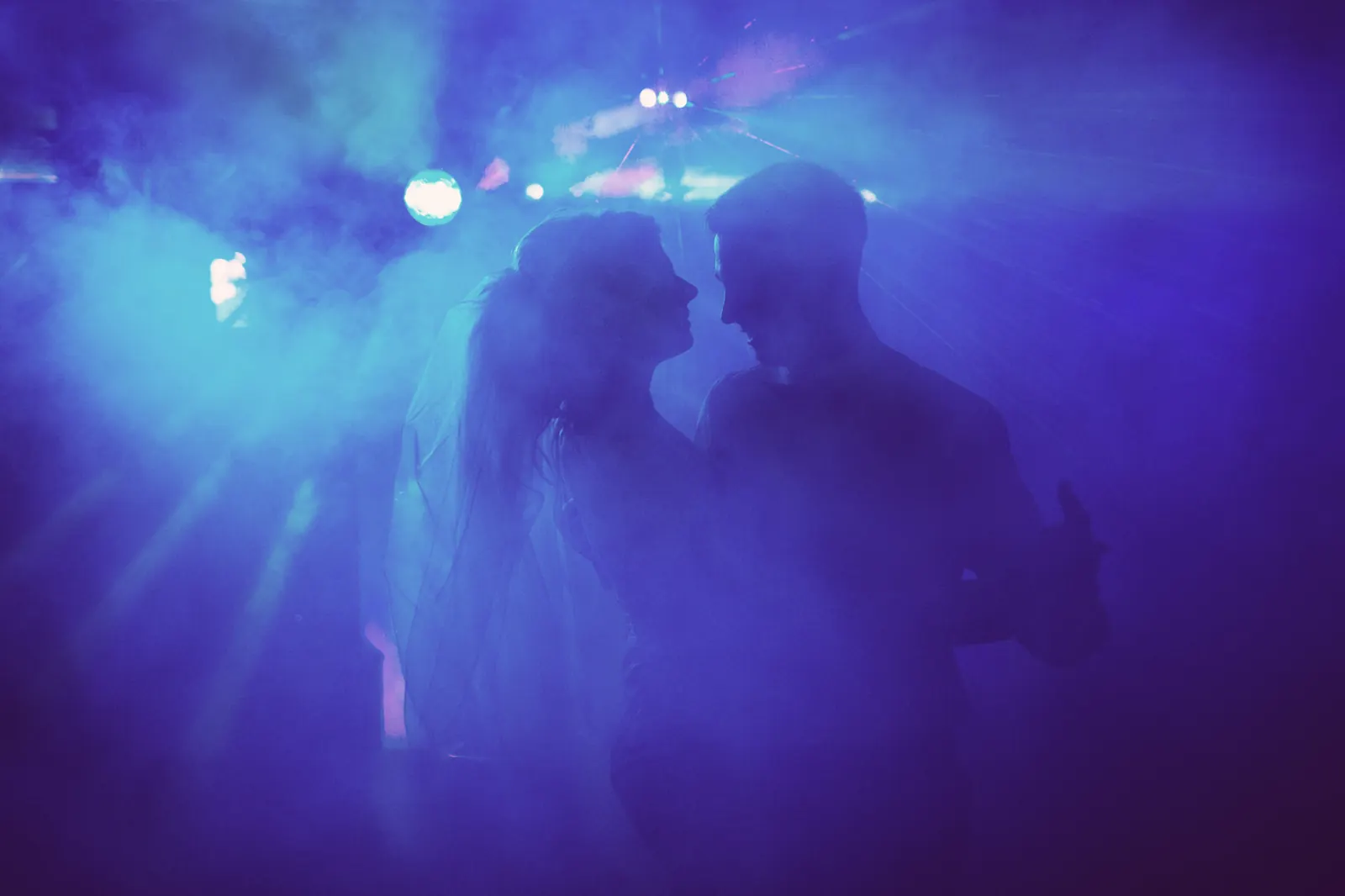 Dance floor lit in blue at a corporate party